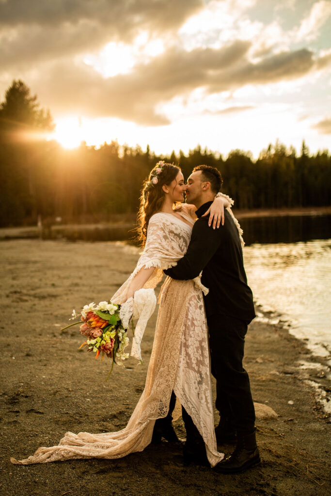 Sunset kiss during a Whonnock Lake wedding editorial shoot