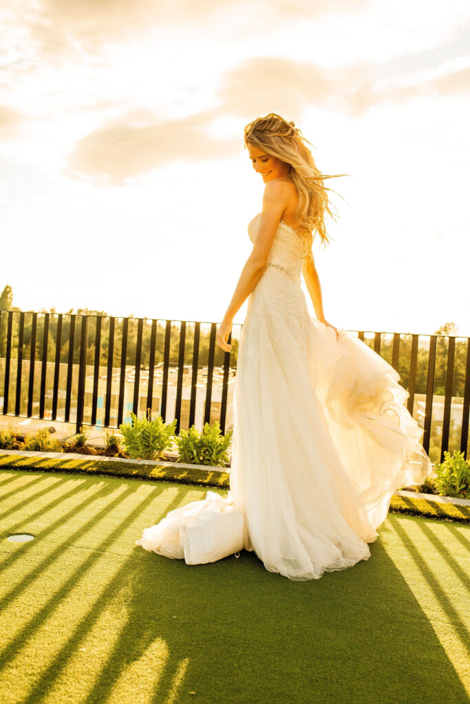 Bride at golden hour at her Redwoods Golf Course Wedding