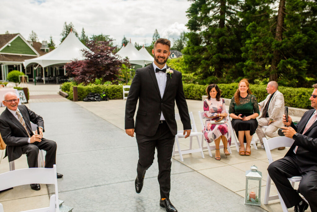 Groom walking to his Redwoods Golf Course Wedding