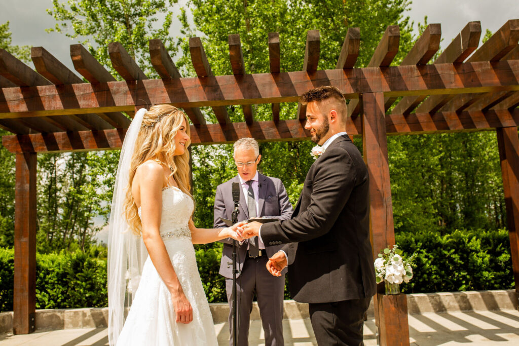 Exchanging vows at a Redwoods Golf Course Wedding