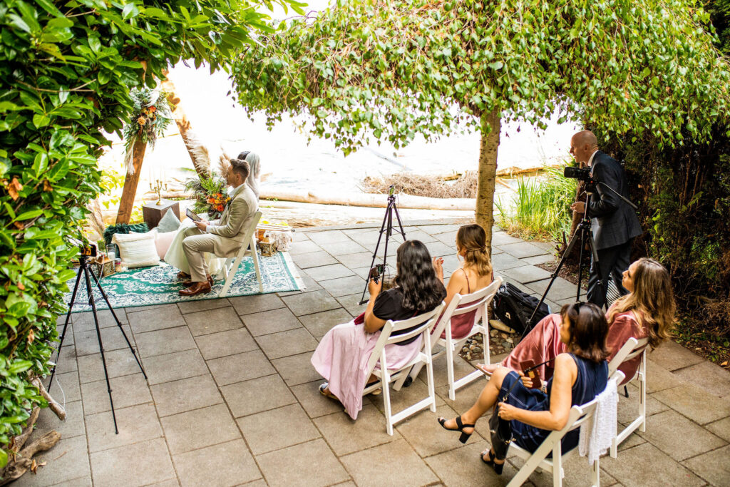 Guests watch a Bohemian wedding in Vancouver BC