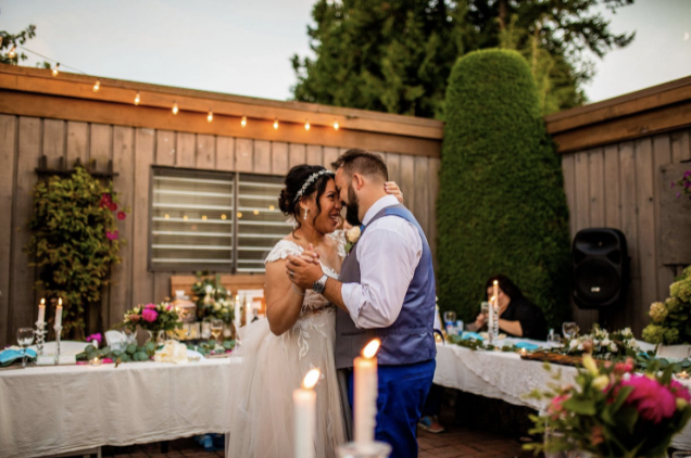 Newlyweds dancing at their backyard wedding ceremony in BC