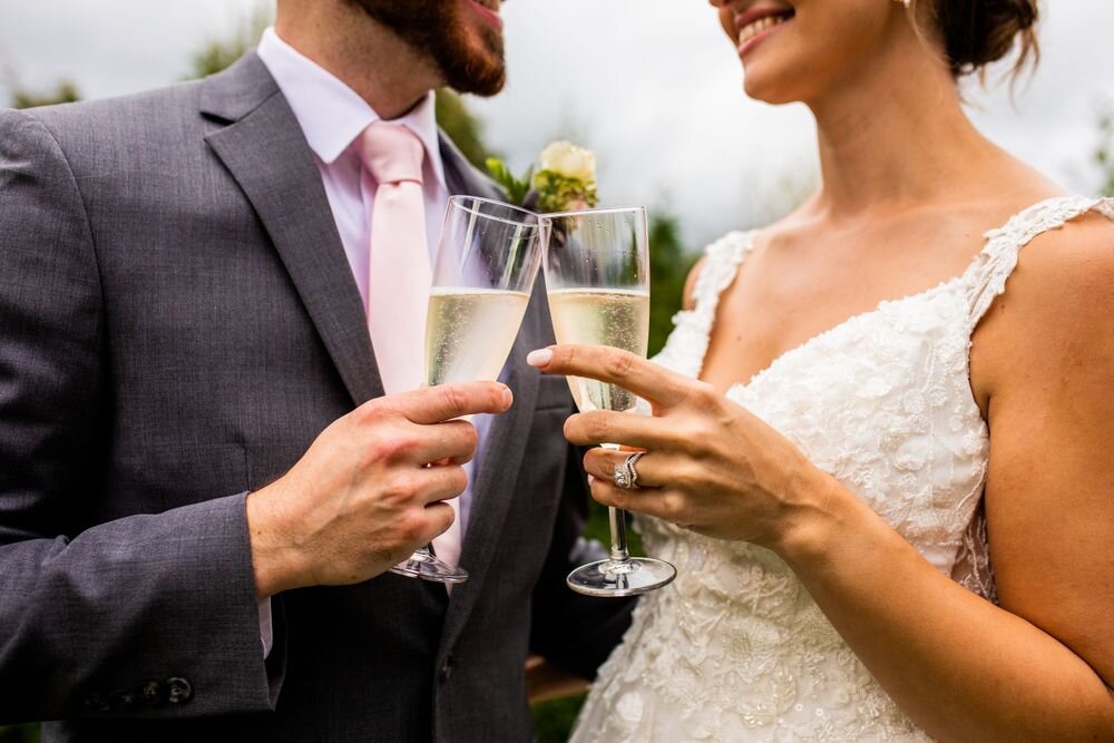 Toasting with champagne at an intimate backyard wedding in Maple Ridge BC
