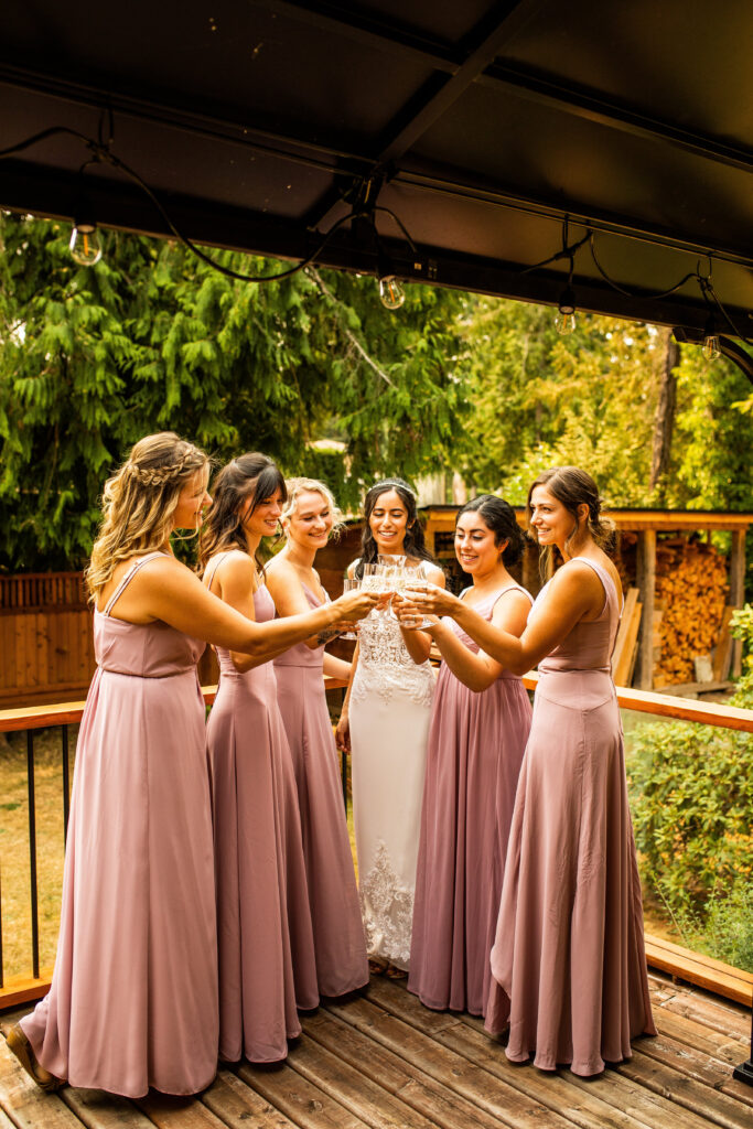 Bride and bridesmaids at Vancouver Island Wedding At Enrico Winery