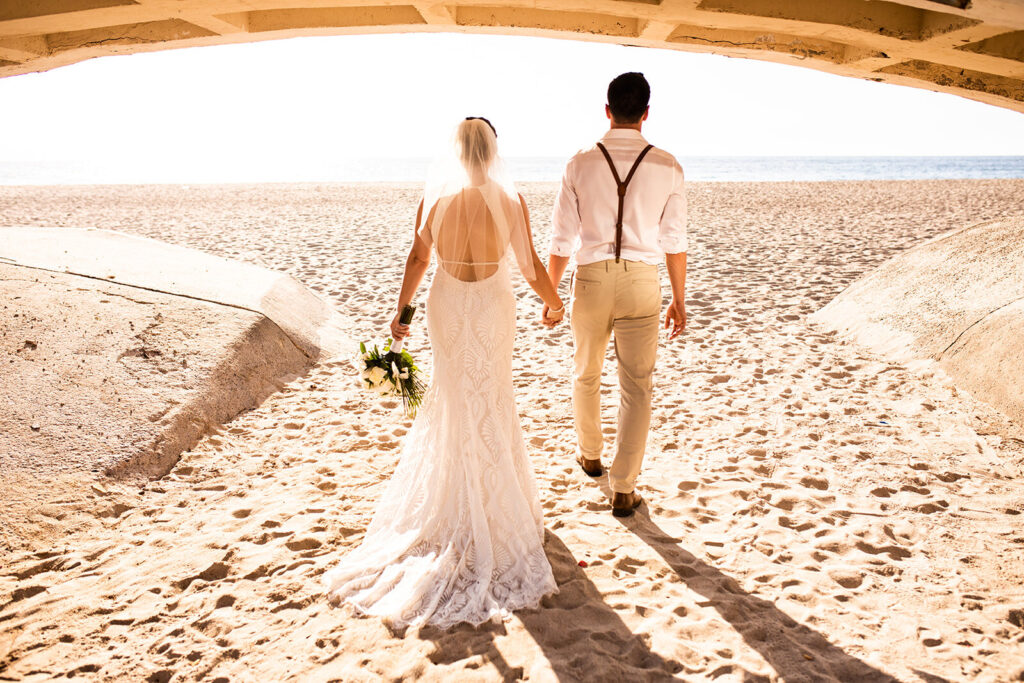 Puerto Vallarta beach wedding with couple holding hands