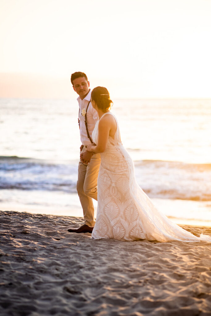 Mexico wedding with couple walking on the beach