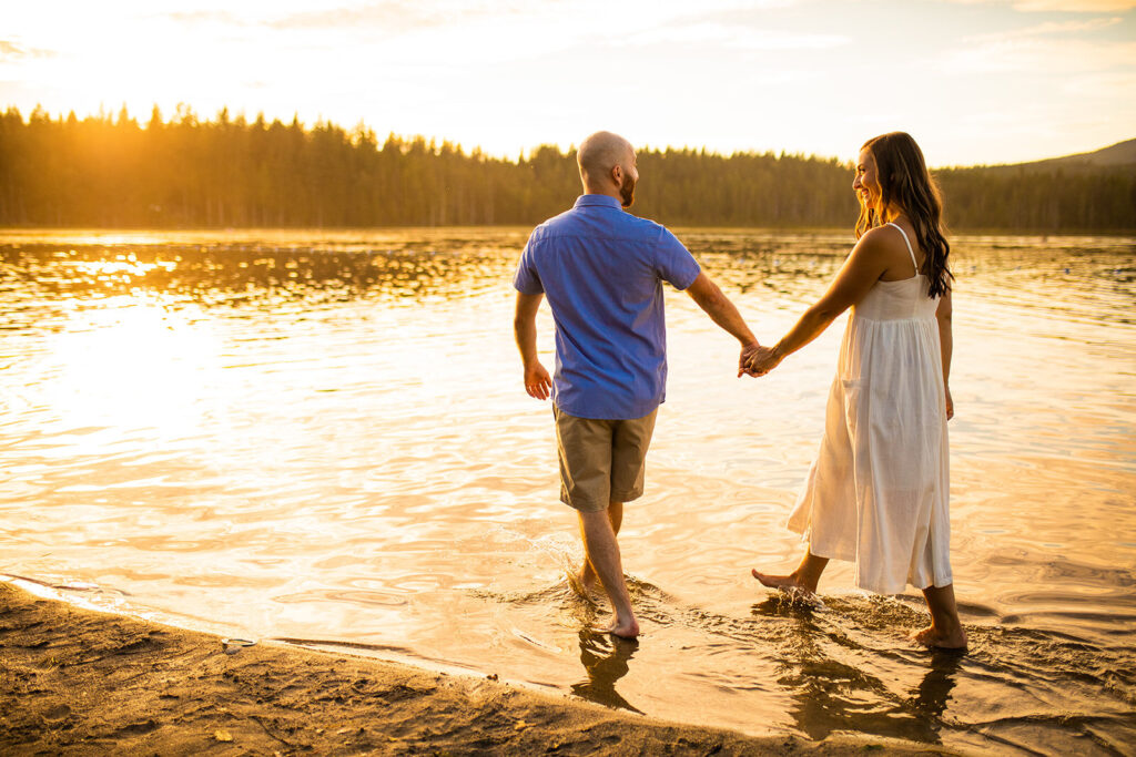 Golden hour engagement photos on a lake in BC