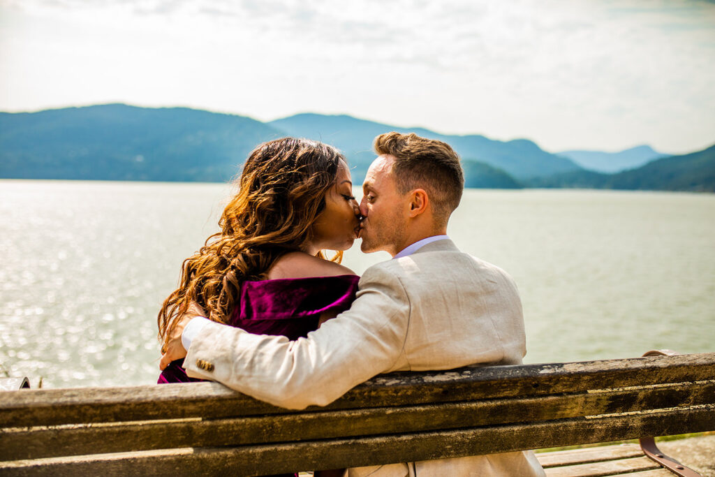 Couple kissing on a lake in BC