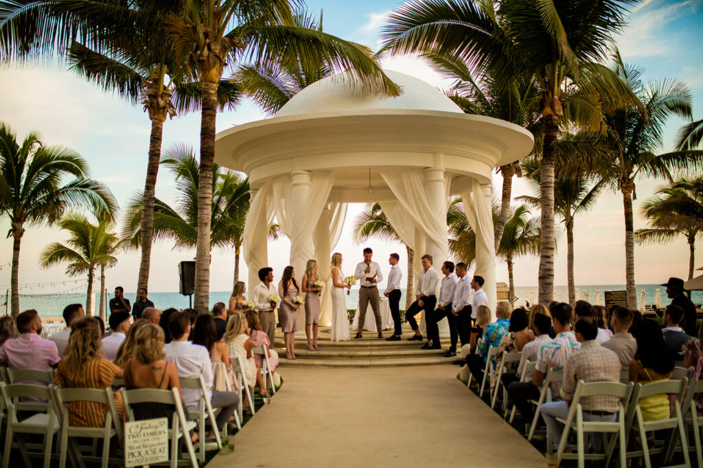 Beautiful outdoor wedding venue in Cabo San Lucas with palm trees