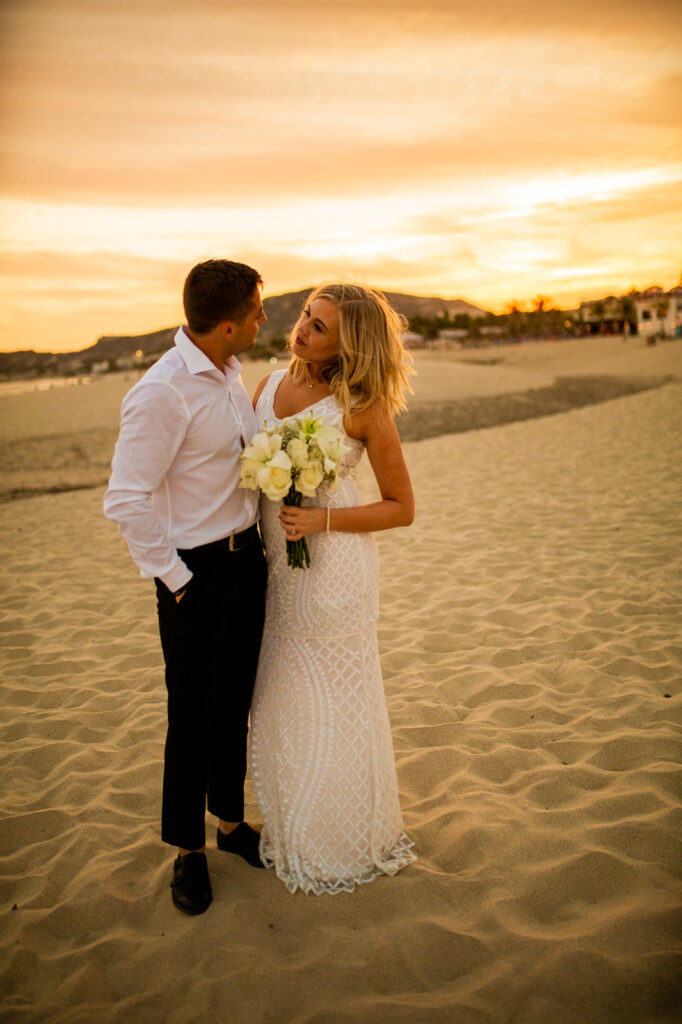 Couples portrait during sunset on a Cabo San Lucas beach