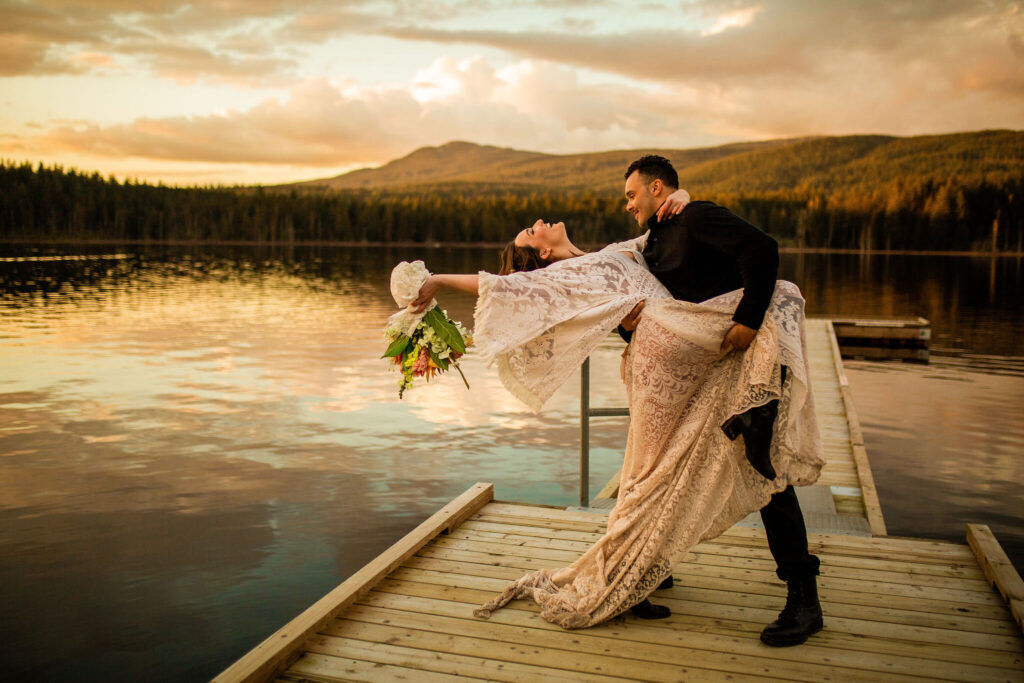 Groom dipping bride on a Whonnock Lake wedding editorial shoot