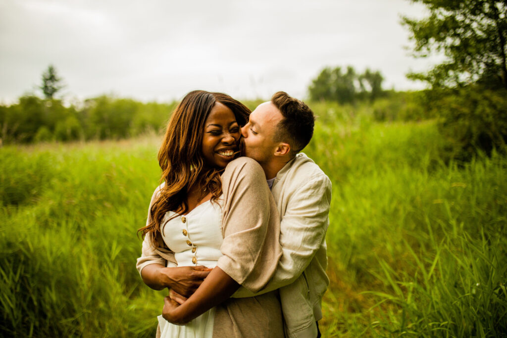A relaxed wedding photographer helps clients feel at ease