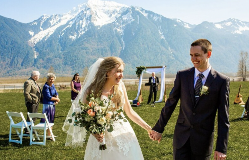 Vancouver wedding ceremony with mountain backdrop