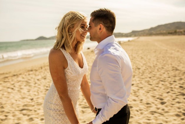 Newlywed portrait on the beach at a Cabo wedding