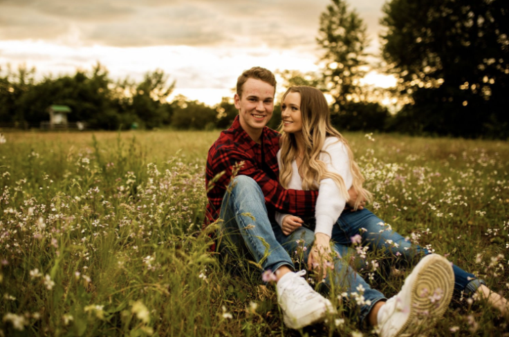 Engagement photoshoot in a field of wildflowers