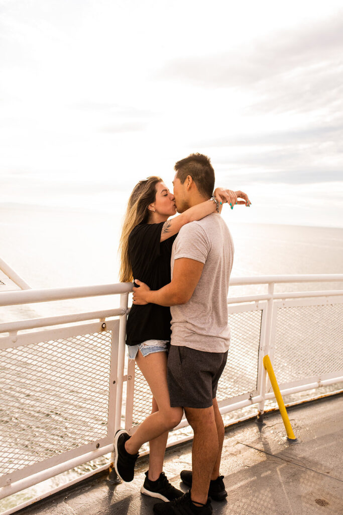 Couples kissing during a photoshoot on Victoria ferry in Canada