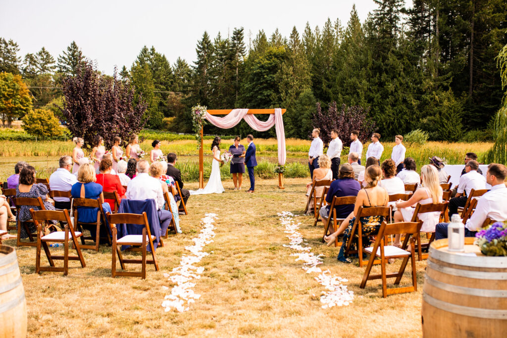 Bride and groom at Vancouver Island Wedding ceremony At Enrico Winery
