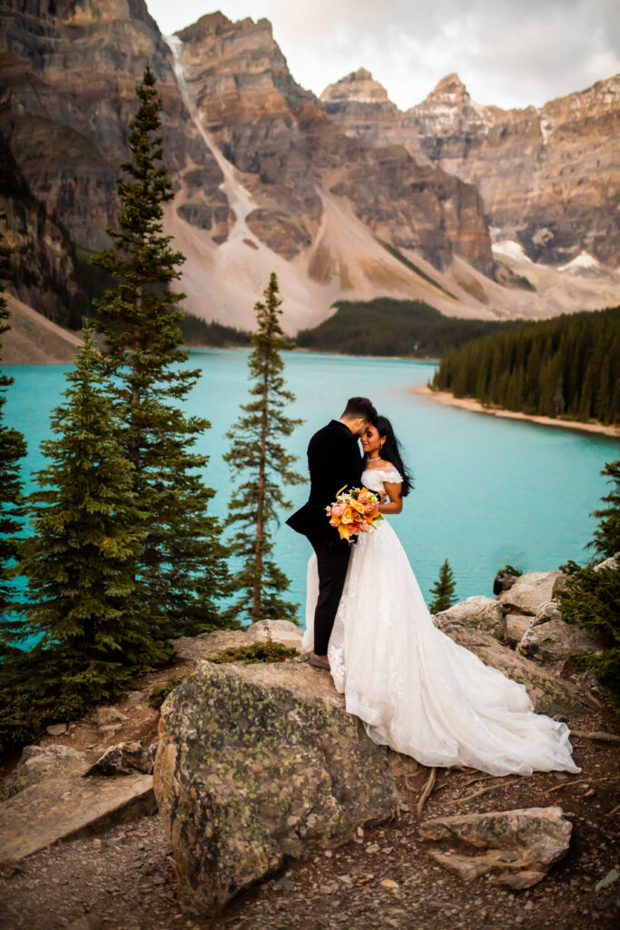 Couples photoshoot with mountain backdrop in Alberta Canada