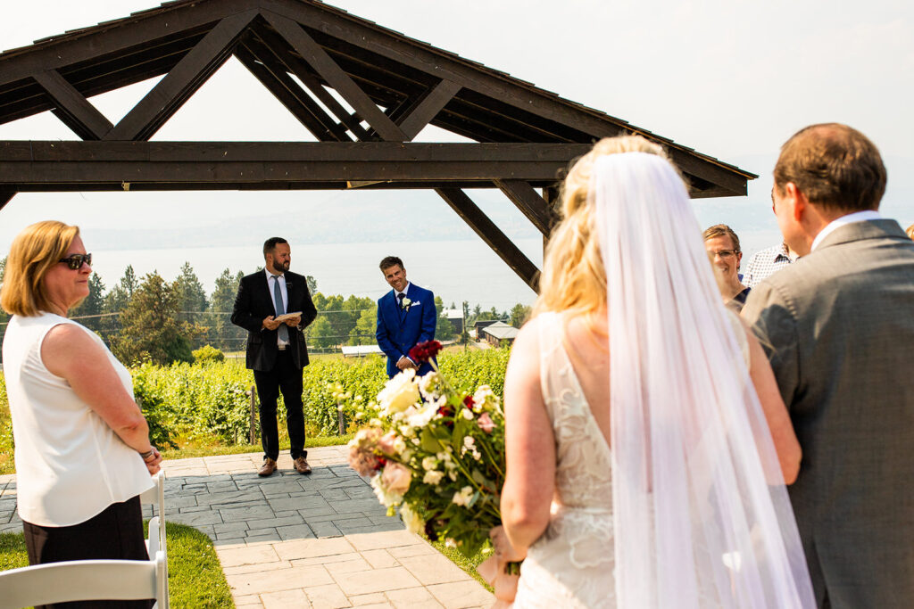 Bride walking down the aisle at her Summerhill Pyramid Winery wedding