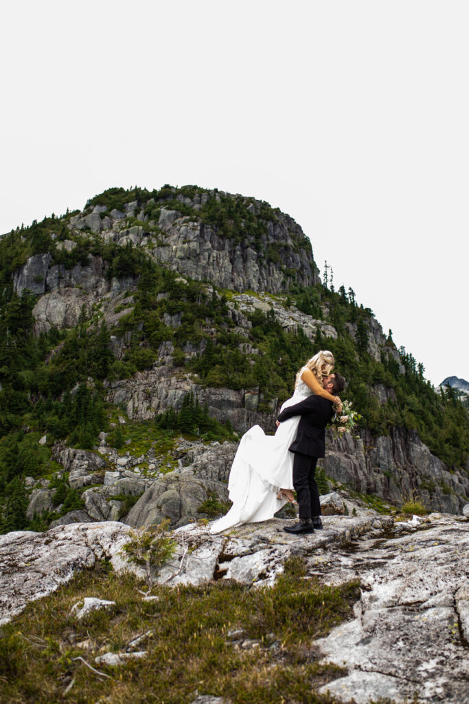Heli wedding photos on top of a mountain