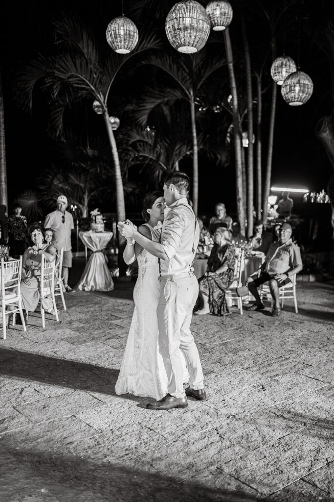 Black and white photo of couple dancing at their Cabo San Lucas wedding