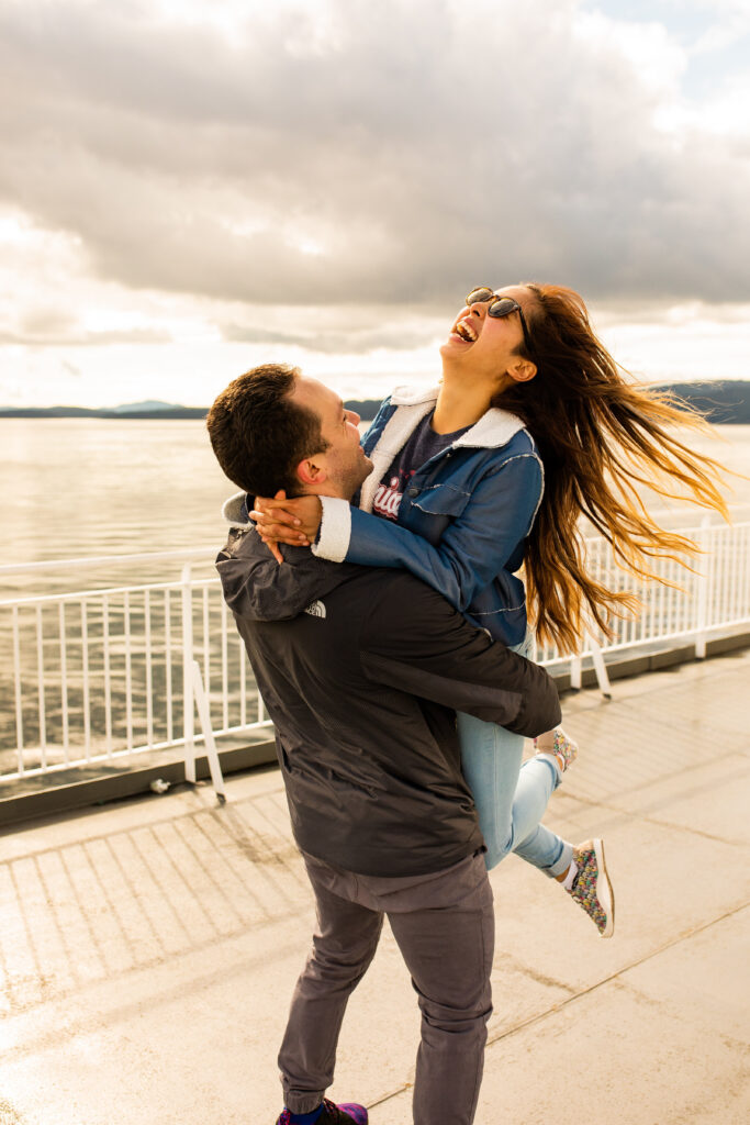 Couples laughing together during a photoshoot on Victoria ferry in Canada