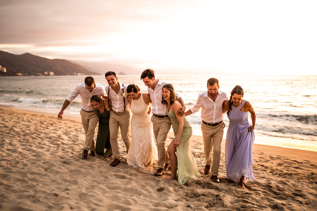 Cabo San Lucas wedding group photo on the beach at sunset