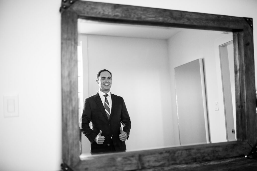 Groom getting ready at his Vancouver Island Wedding At Enrico Winery