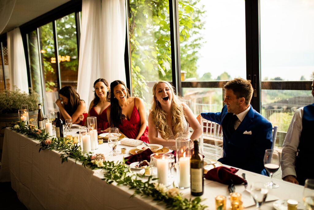 Bride laughing at her Kelowna wedding reception