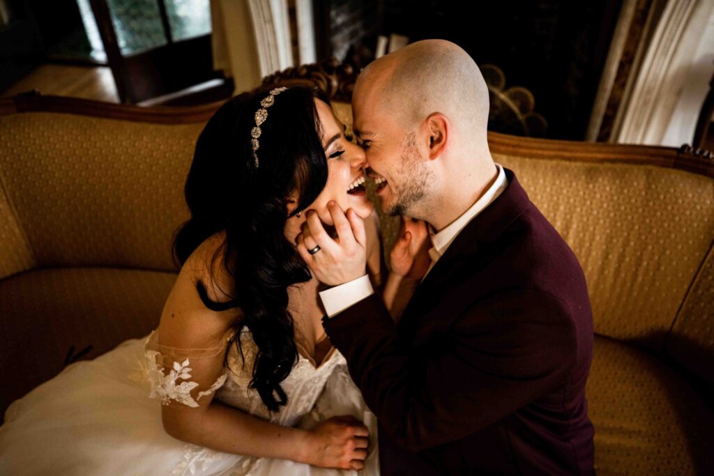Couple kissing at Hycroft Manor wedding in Vancouver
