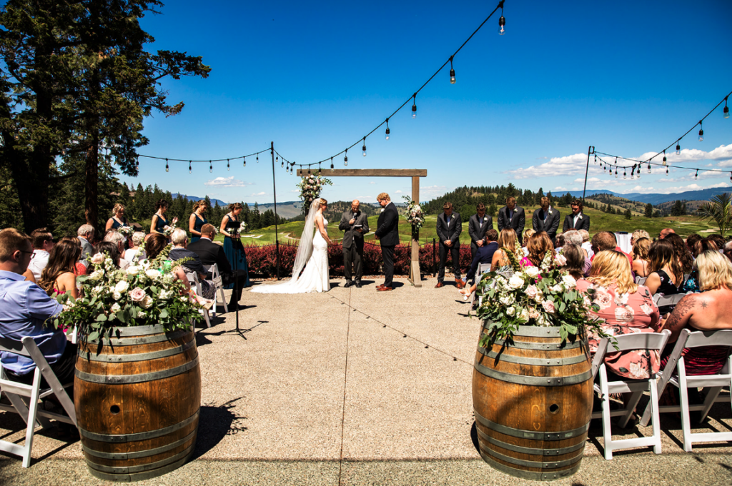 Okanagan wedding ceremony with wine barrels