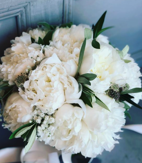 Bridal floral arrangement with white peonies
