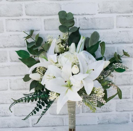 Lilies with eucalyptus for a bridal bouquet