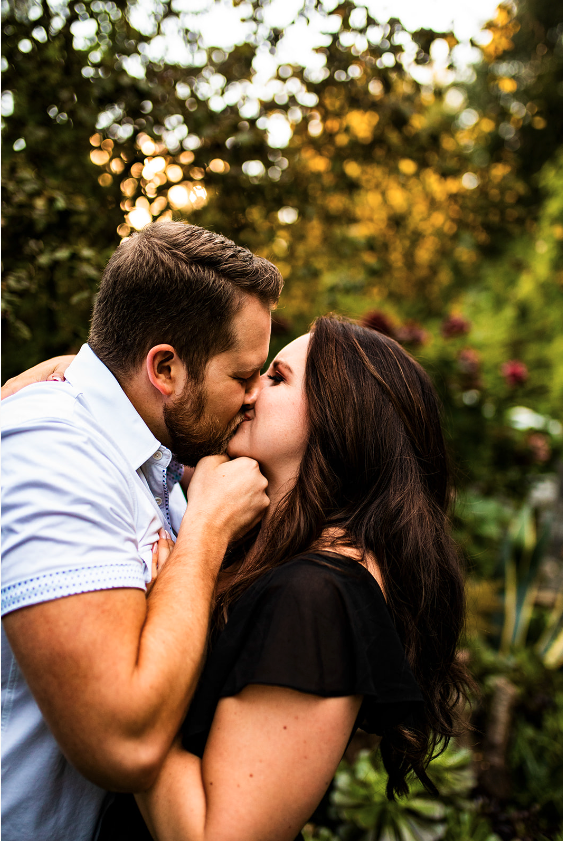 Engaged couple kissing in BC photoshoot