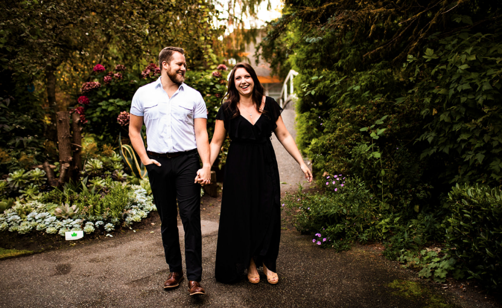 Couple holding hands during engagement shoot in BC